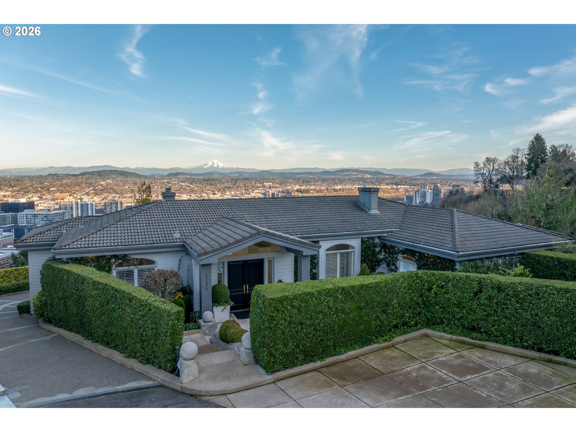 1235 Southwest Myrtle Court Portland, OR 97201 - Photo 12 of 14 a front view of a house with a yard