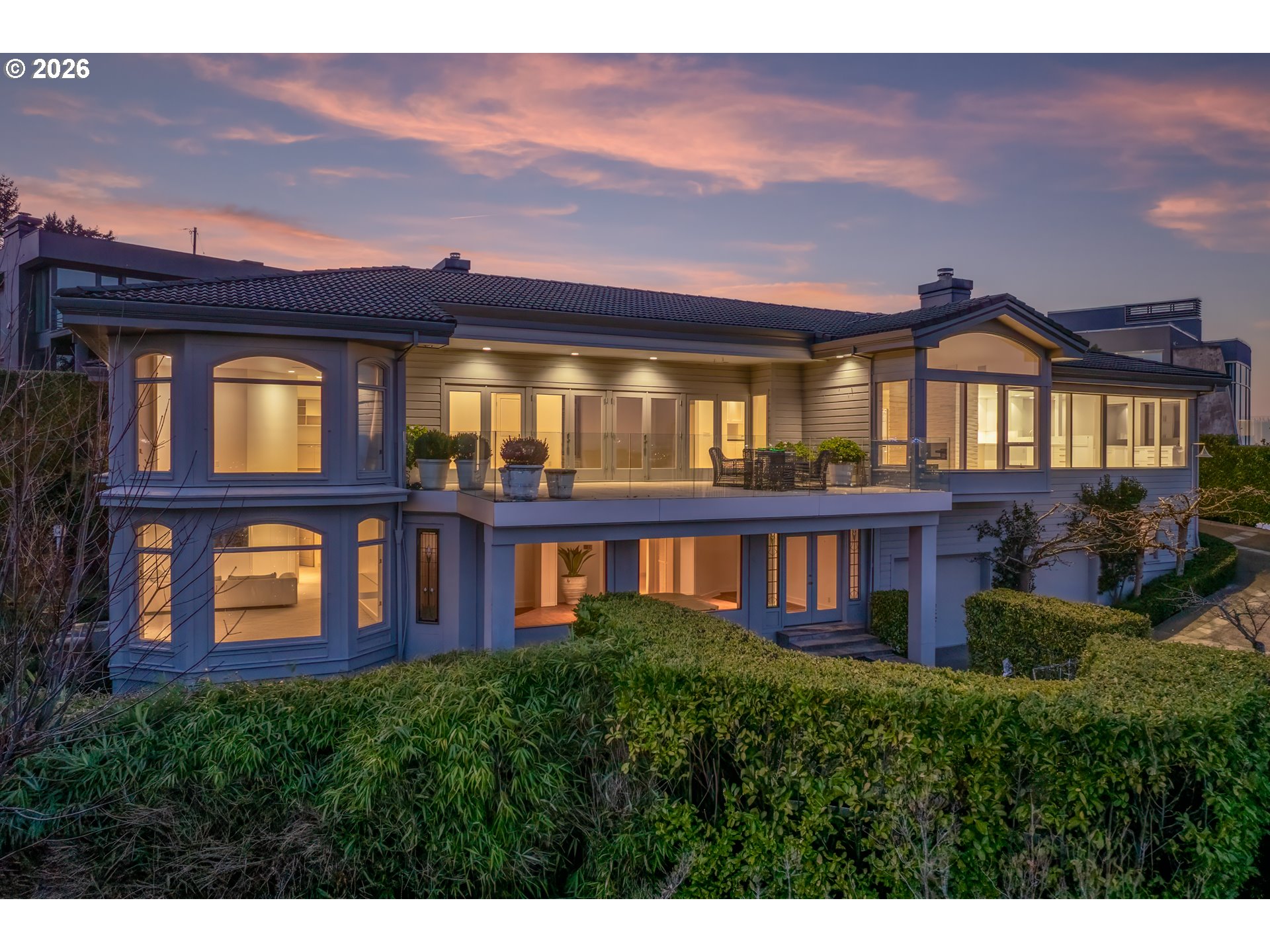 1235 Southwest Myrtle Court Portland, OR 97201 - Photo 6 of 14 a front view of a residential apartment building with a yard
