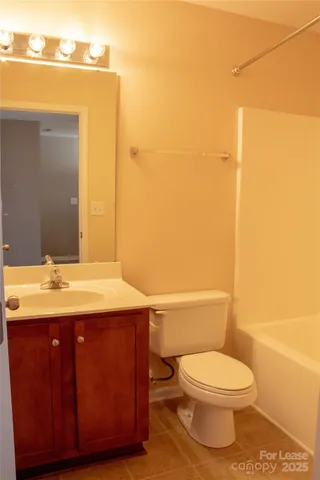 a utility room with washer and dryer