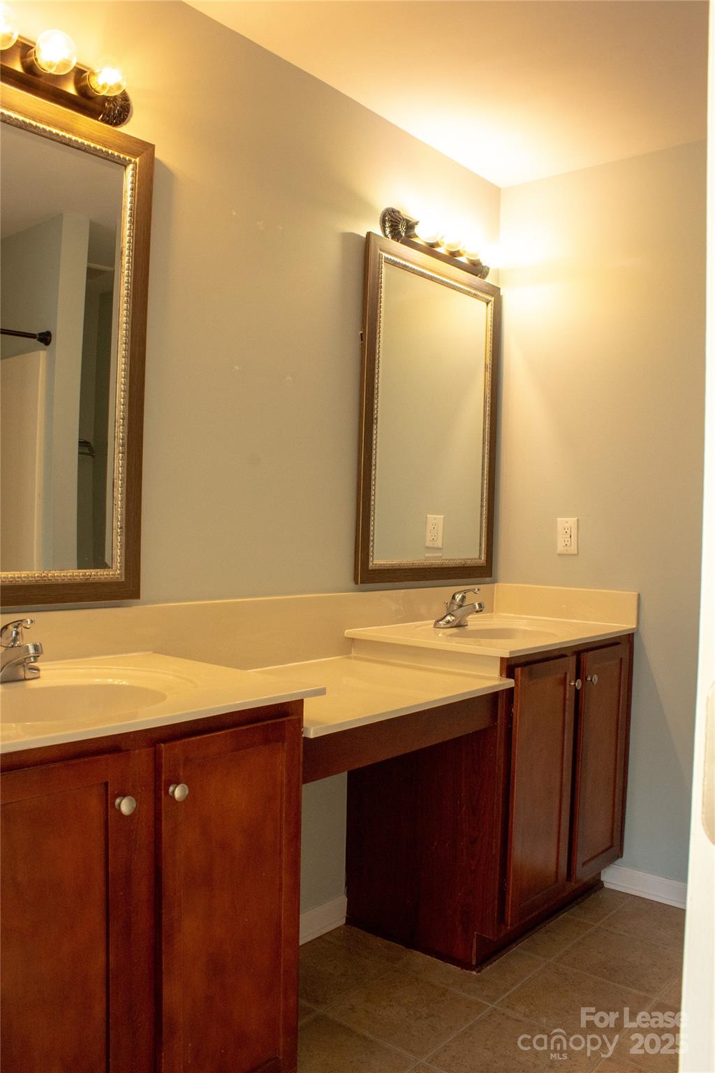 2049 Twilight Lane Monroe, NC 28110 - Photo 16 of 17 a bathroom with a granite countertop sink and a mirror