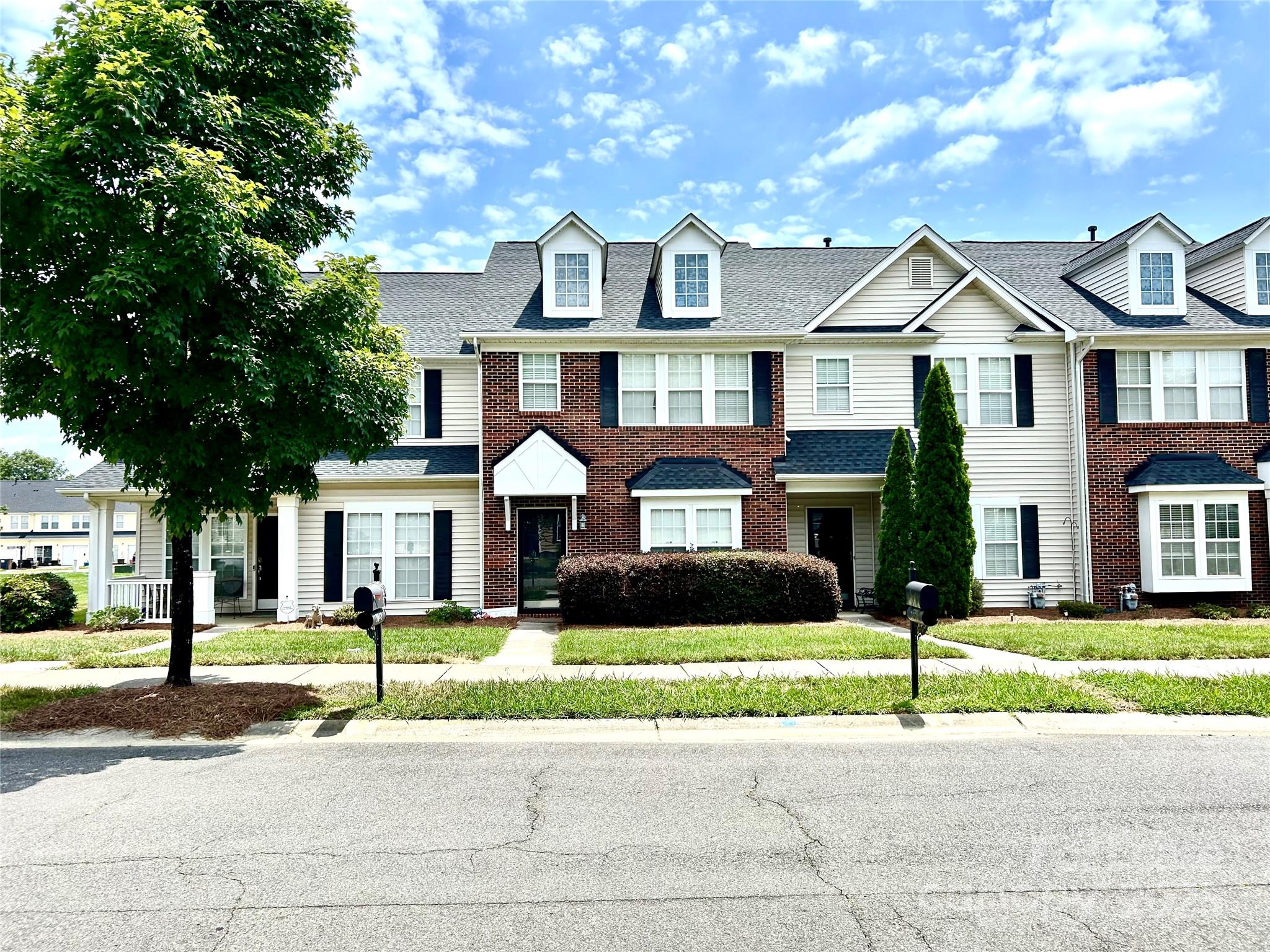2049 Twilight Lane Monroe, NC 28110 - Photo 2 of 17 a front view of a house with a yard