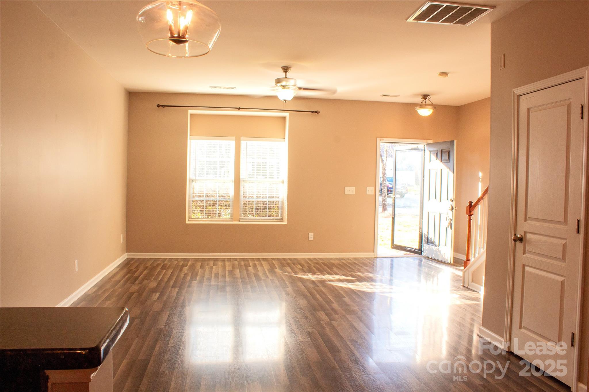 2049 Twilight Lane Monroe, NC 28110 - Photo 5 of 17 wooden floor in an empty room with a window