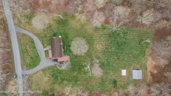 a bathroom with a shower and yard