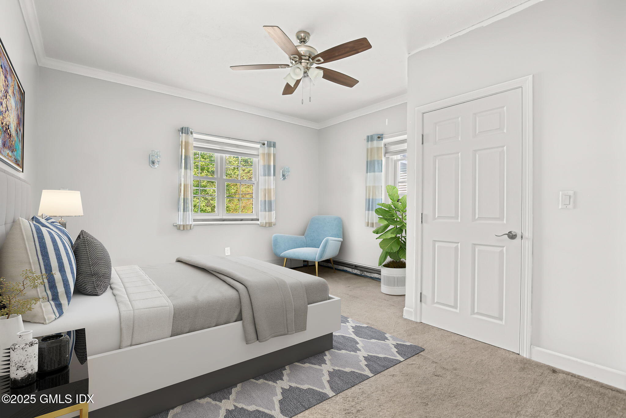 43 Cos Cob Avenue, Unit 1 Cos Cob, CT 06807 - Photo 6 of 10 a bedroom with a bed and a chandelier