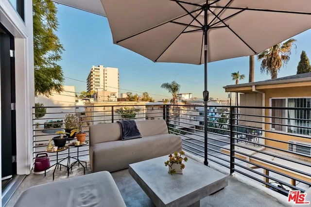 a view of a terrace with seating space