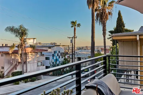 a view of city from a balcony
