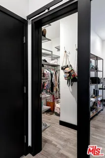 a view of a living room and a room