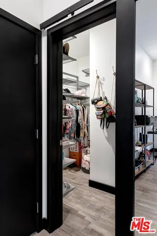 a view of a living room and a room