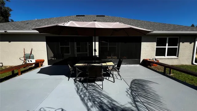 a front view of house with yard outdoor seating
