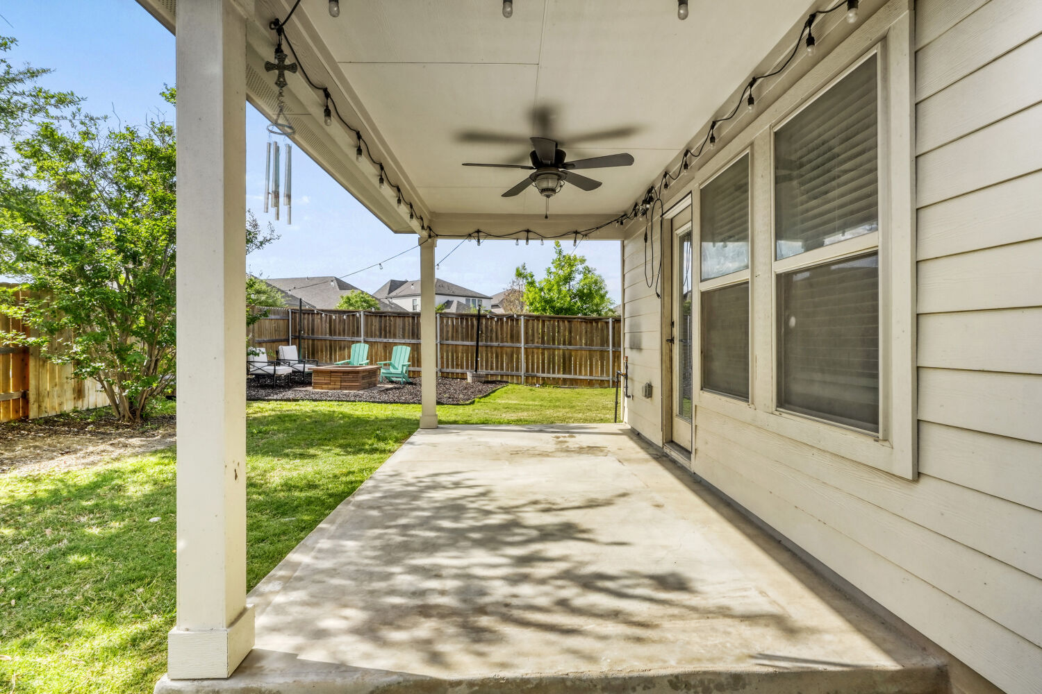 426 Cold Riv Run Kyle, TX 78640 - Photo 17 of 24 Covered back patio with outdoor lighting, natural gas hookup, and outdoor ceiling fan