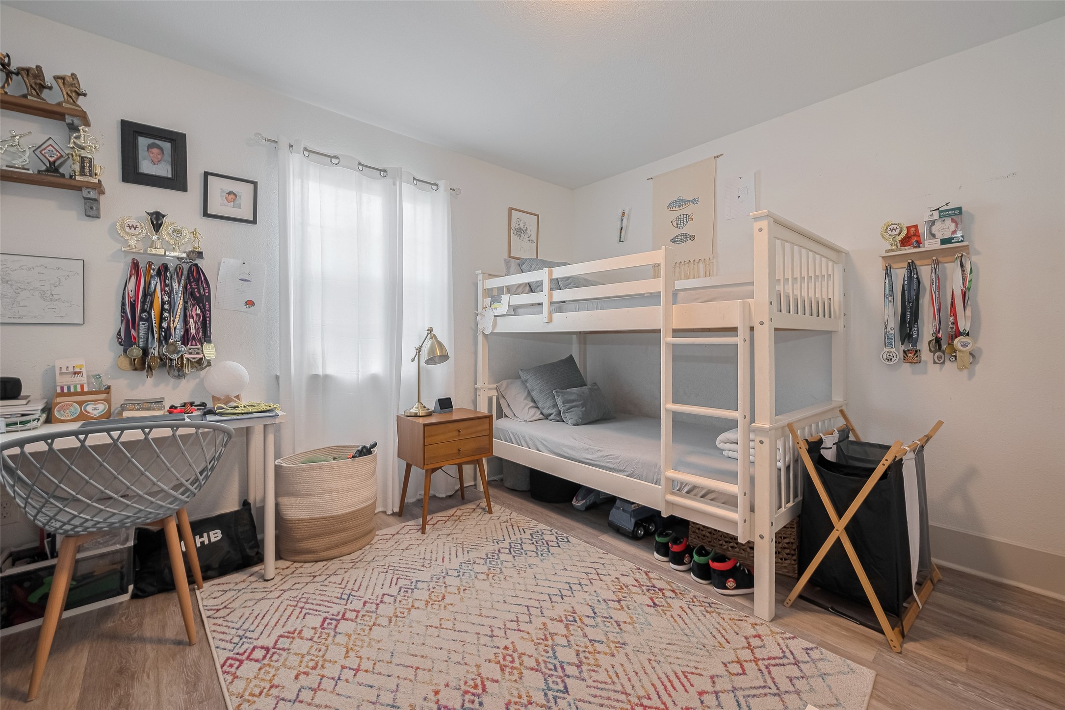 1540 Sheffield Boulevard Houston, TX 77015 - Photo 11 of 42 a bedroom with furniture and a chair