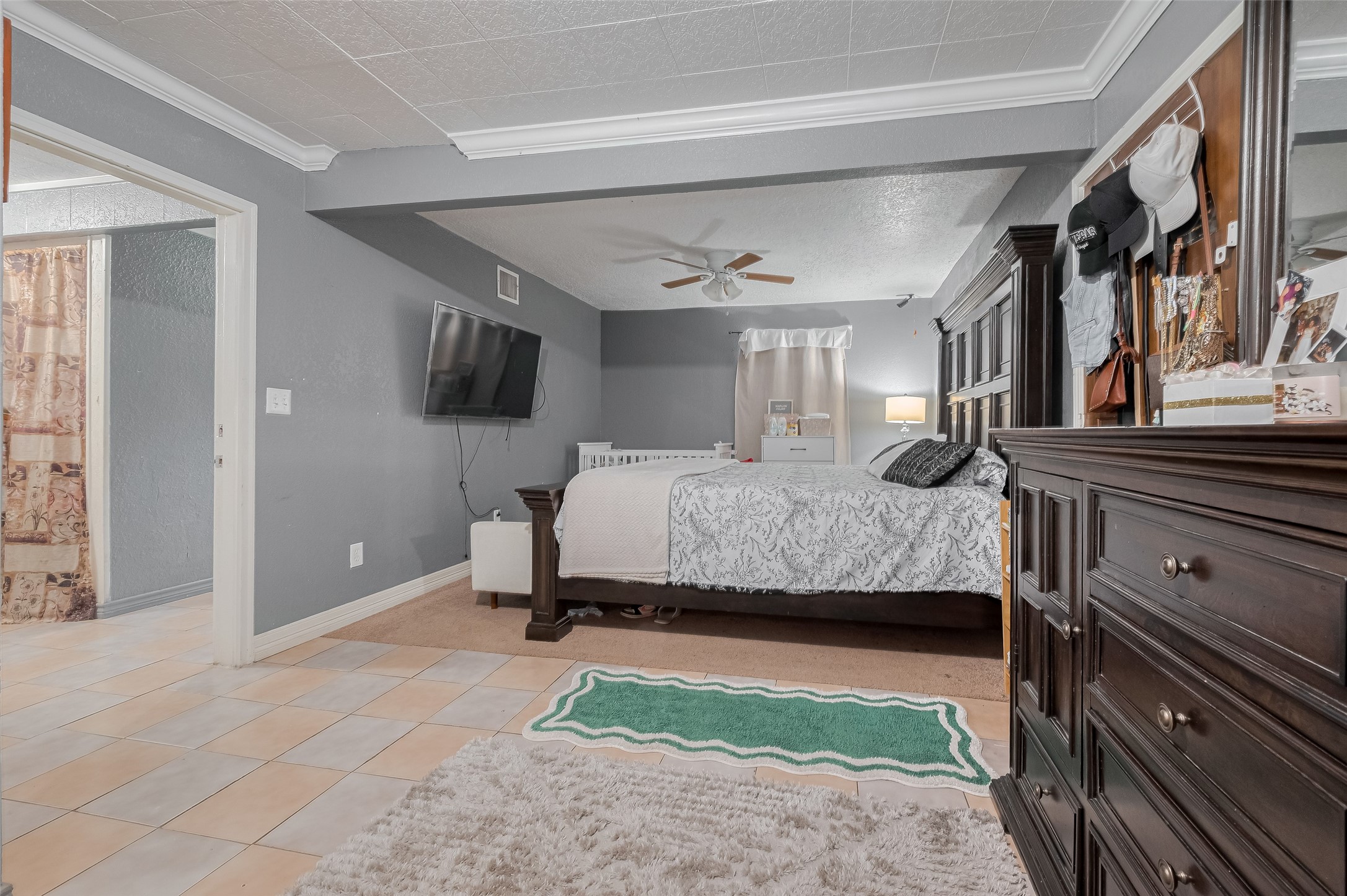 1540 Sheffield Boulevard Houston, TX 77015 - Photo 28 of 42 a bedroom with a bed and a television