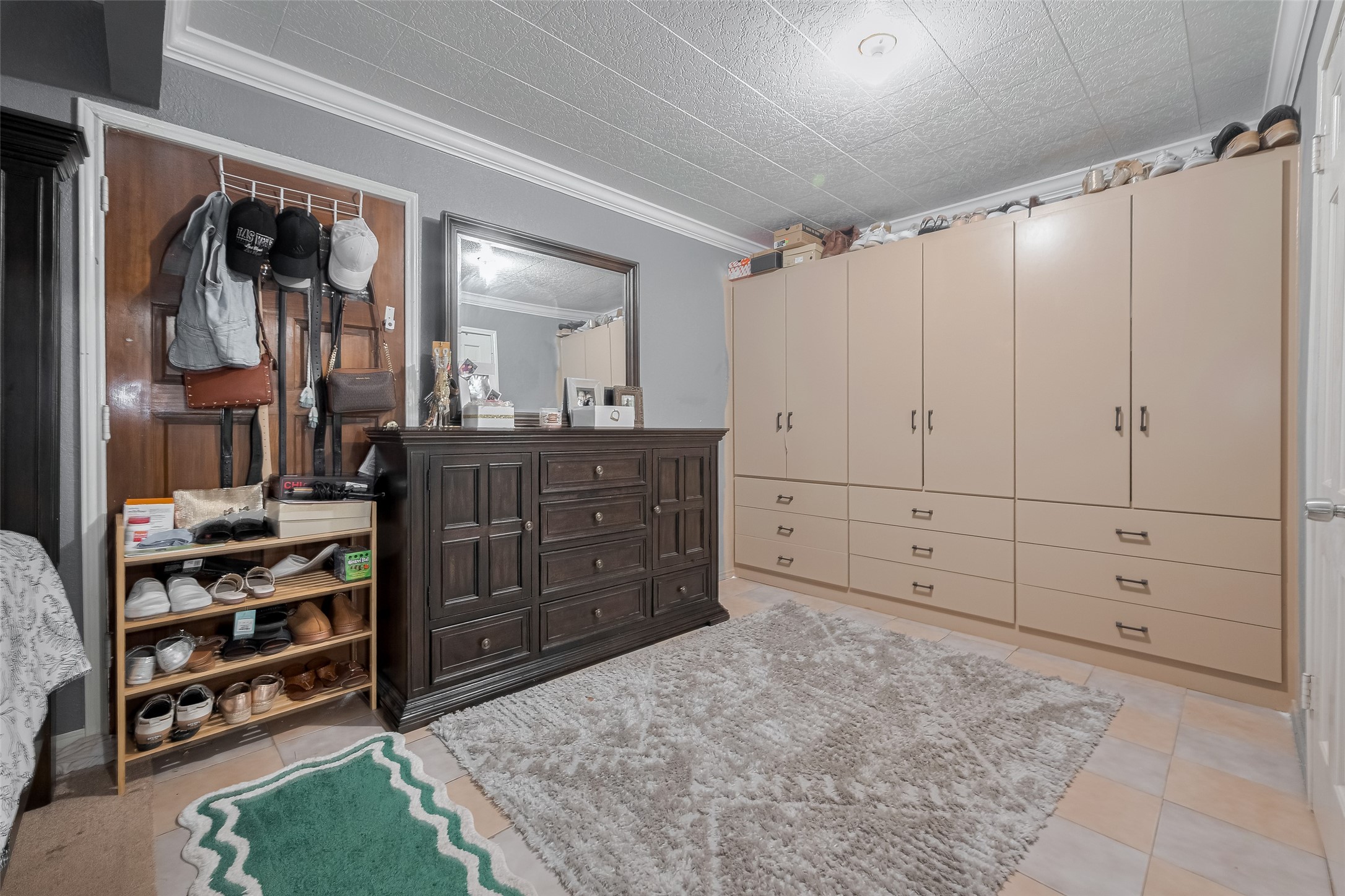 1540 Sheffield Boulevard Houston, TX 77015 - Photo 29 of 42 a view of a bedroom with closet and cabinet