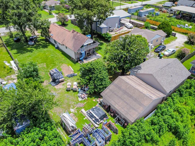 an aerial view of a house with a garden