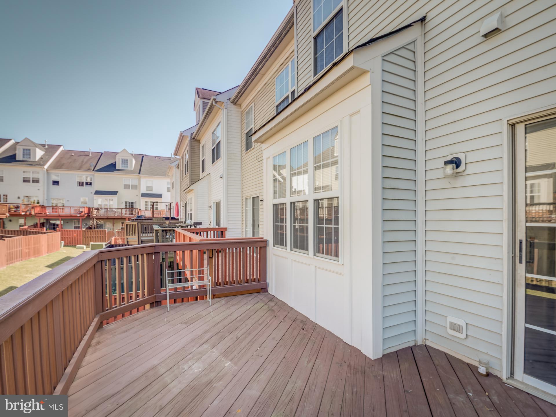 13510 Turquoise Lane Herndon, VA 20170 - Photo 24 of 54 a view of a balcony with wooden floor