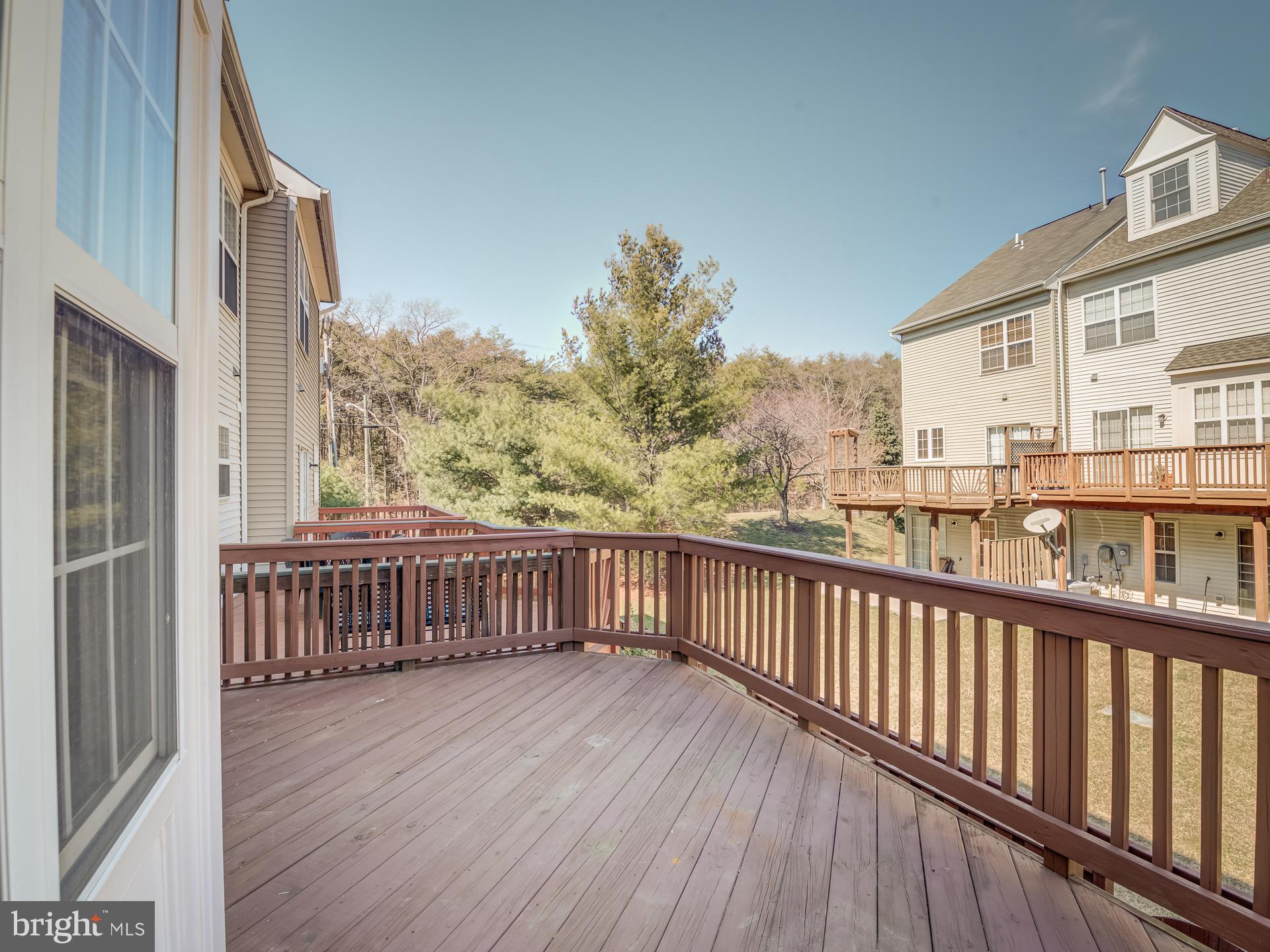 13510 Turquoise Lane Herndon, VA 20170 - Photo 25 of 54 a view of a balcony with wooden floor