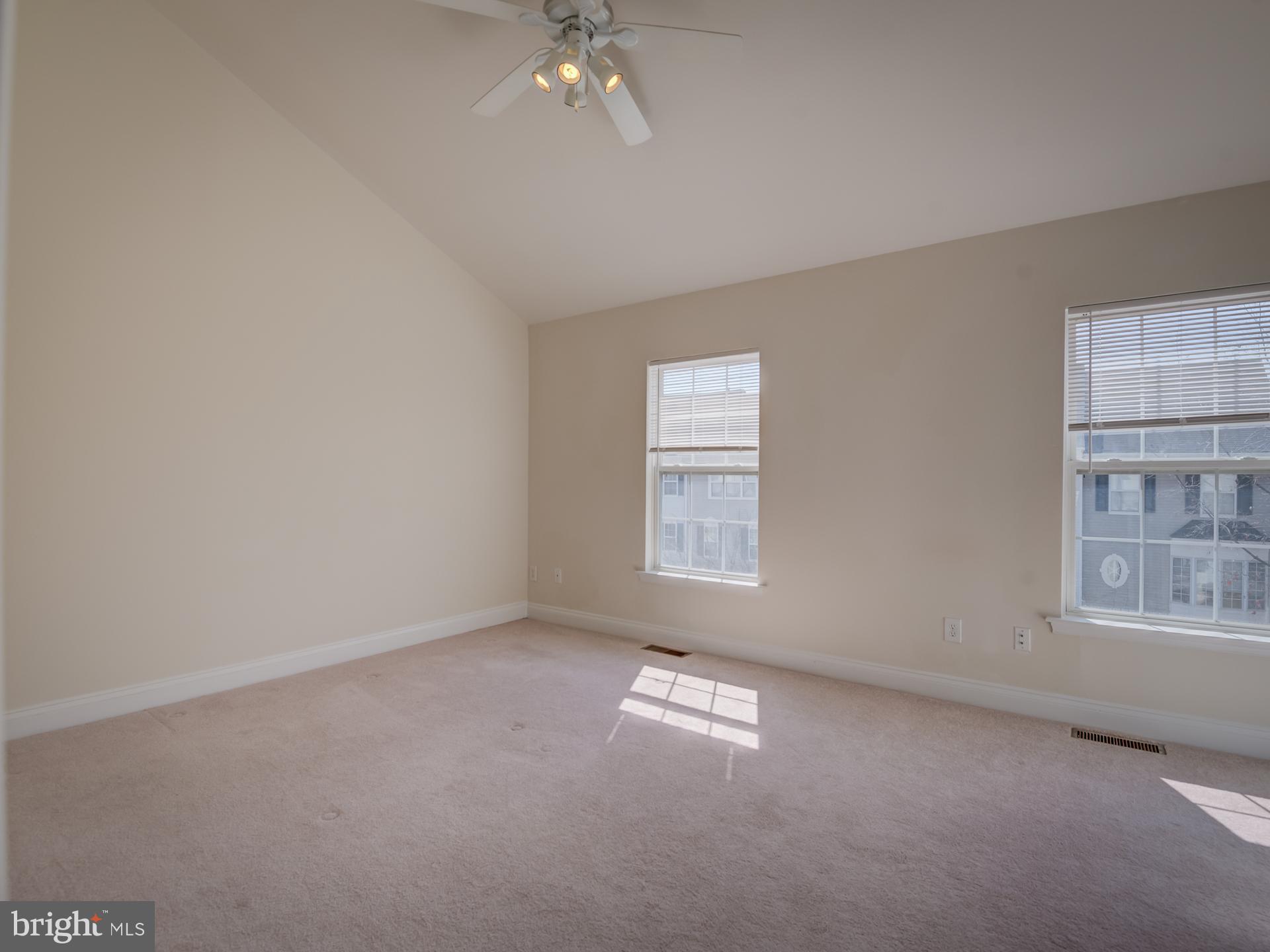 13510 Turquoise Lane Herndon, VA 20170 - Photo 29 of 54 an empty room with windows and fan
