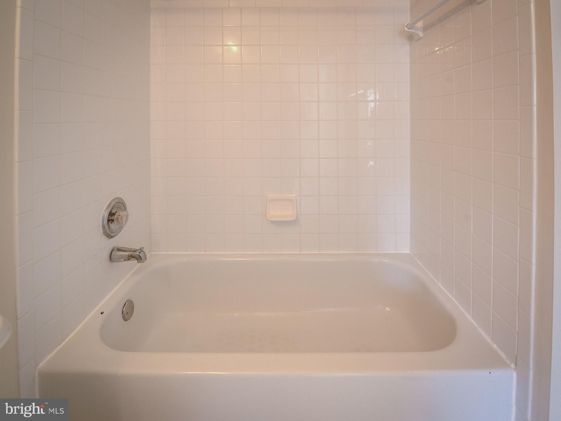 13510 Turquoise Lane Herndon, VA 20170 - Photo 34 of 54 a close view of a bathtub in a bathroom