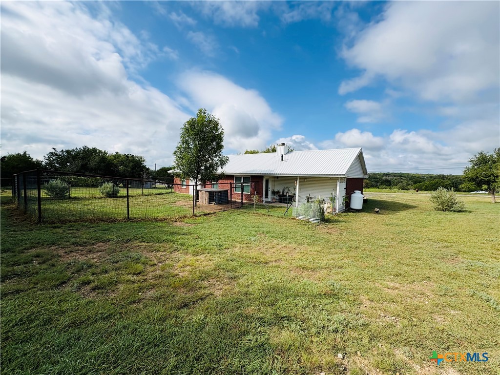 369 County Road 3367 Kempner, TX 76539 - Photo 15 of 18 a view of a big house with a big yard and a large tree