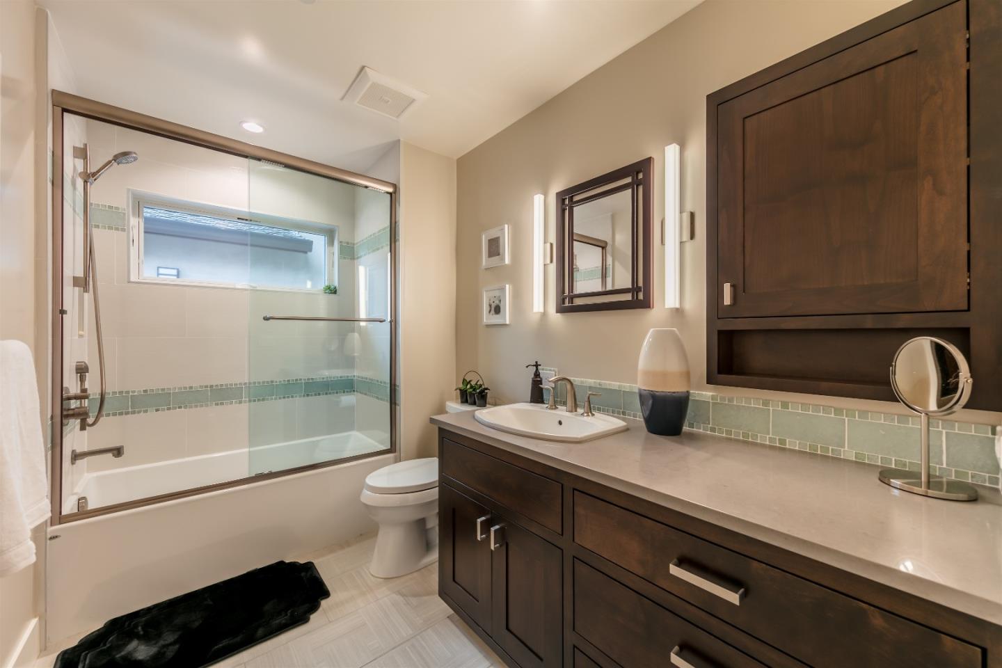 103 Arbuelo Way Los Altos, CA 94022 - Photo 29 of 45 a bathroom with a sink a toilet and shower