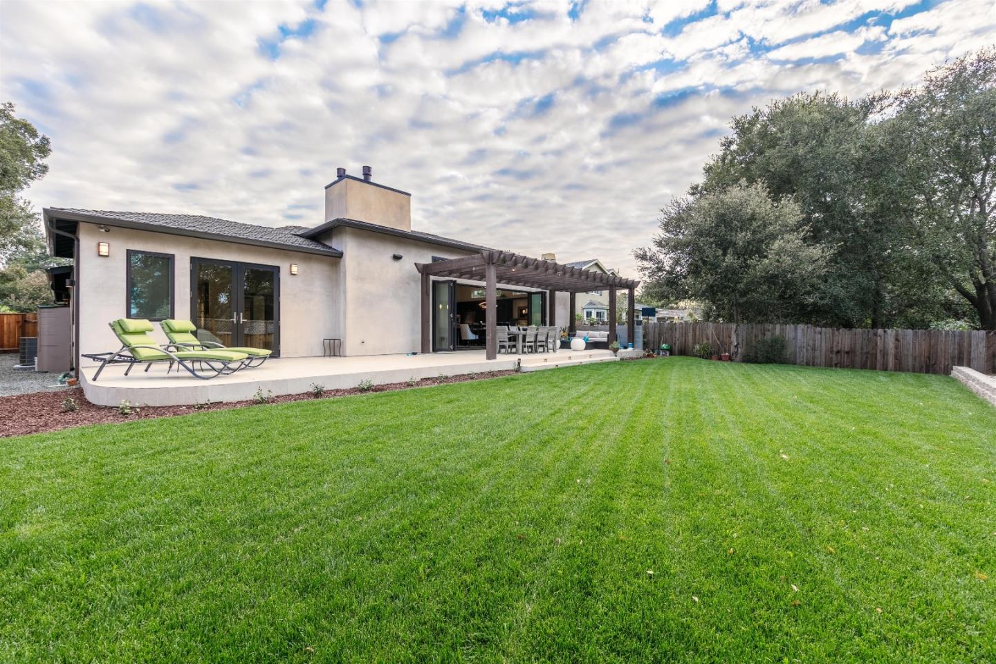 103 Arbuelo Way Los Altos, CA 94022 - Photo 33 of 45 a front view of house with a garden and yard