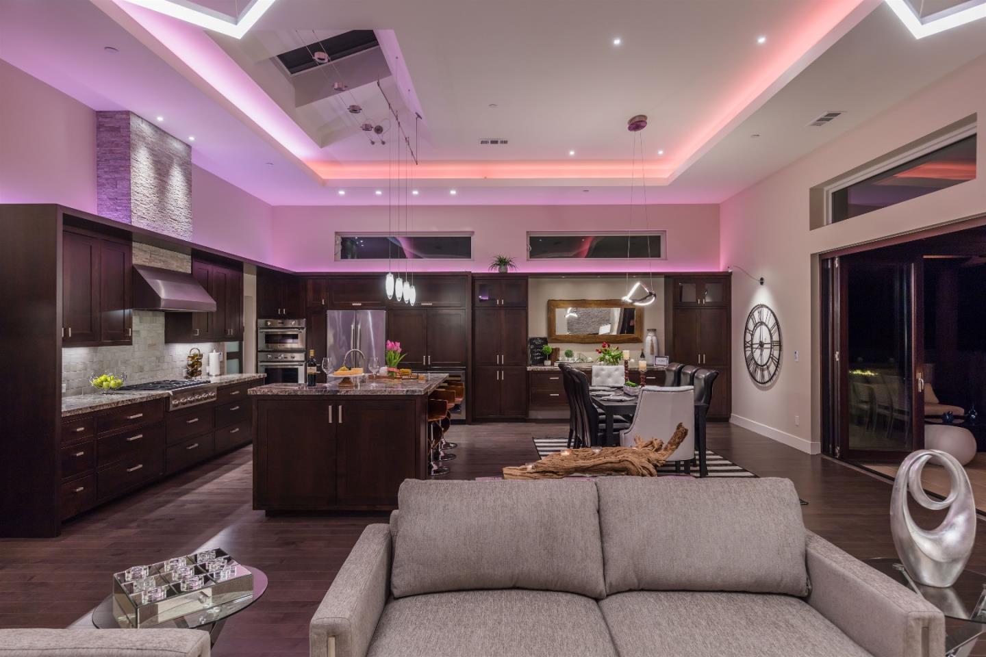 103 Arbuelo Way Los Altos, CA 94022 - Photo 36 of 45 a large living room with stainless steel appliances kitchen island granite countertop furniture and a large window