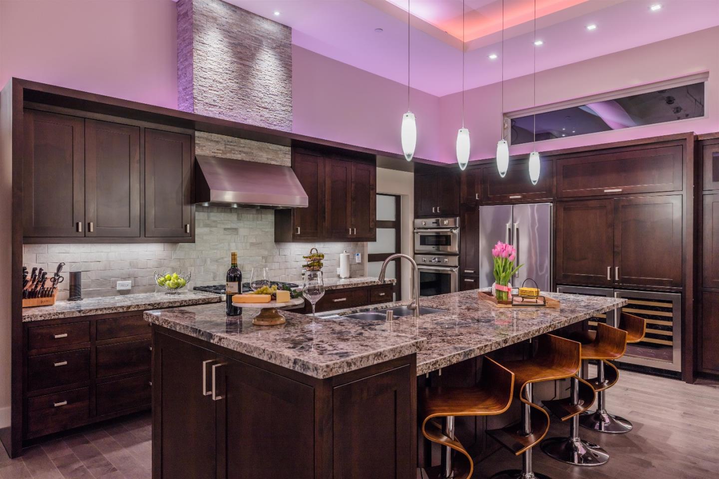 103 Arbuelo Way Los Altos, CA 94022 - Photo 41 of 45 a kitchen with a table and chairs in it