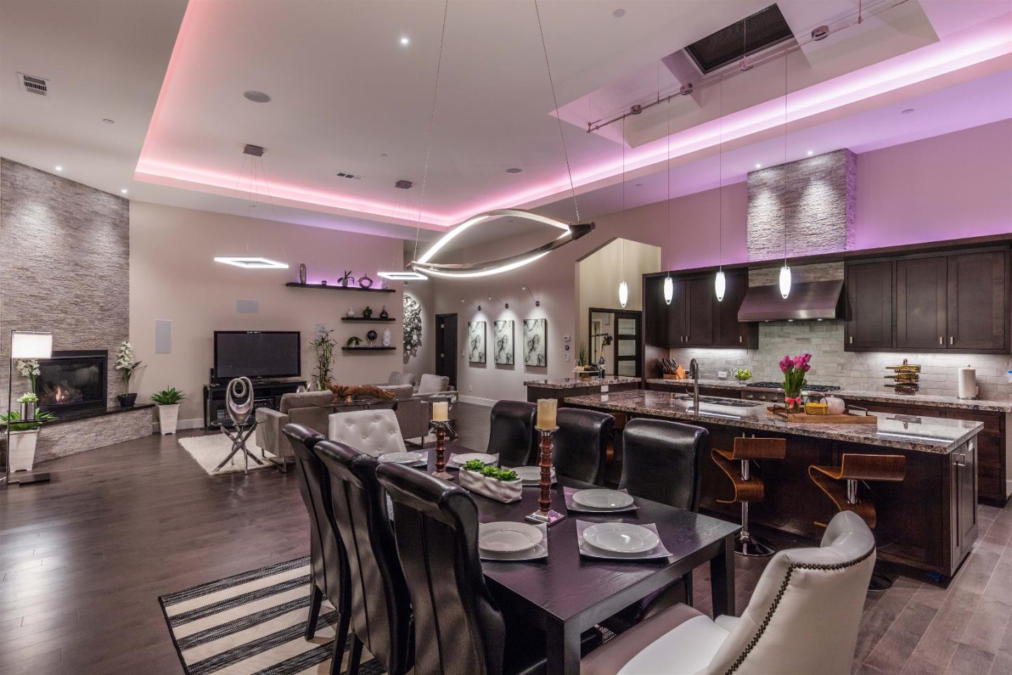 103 Arbuelo Way Los Altos, CA 94022 - Photo 9 of 45 a dining hall with stainless steel appliances kitchen island a table and chairs