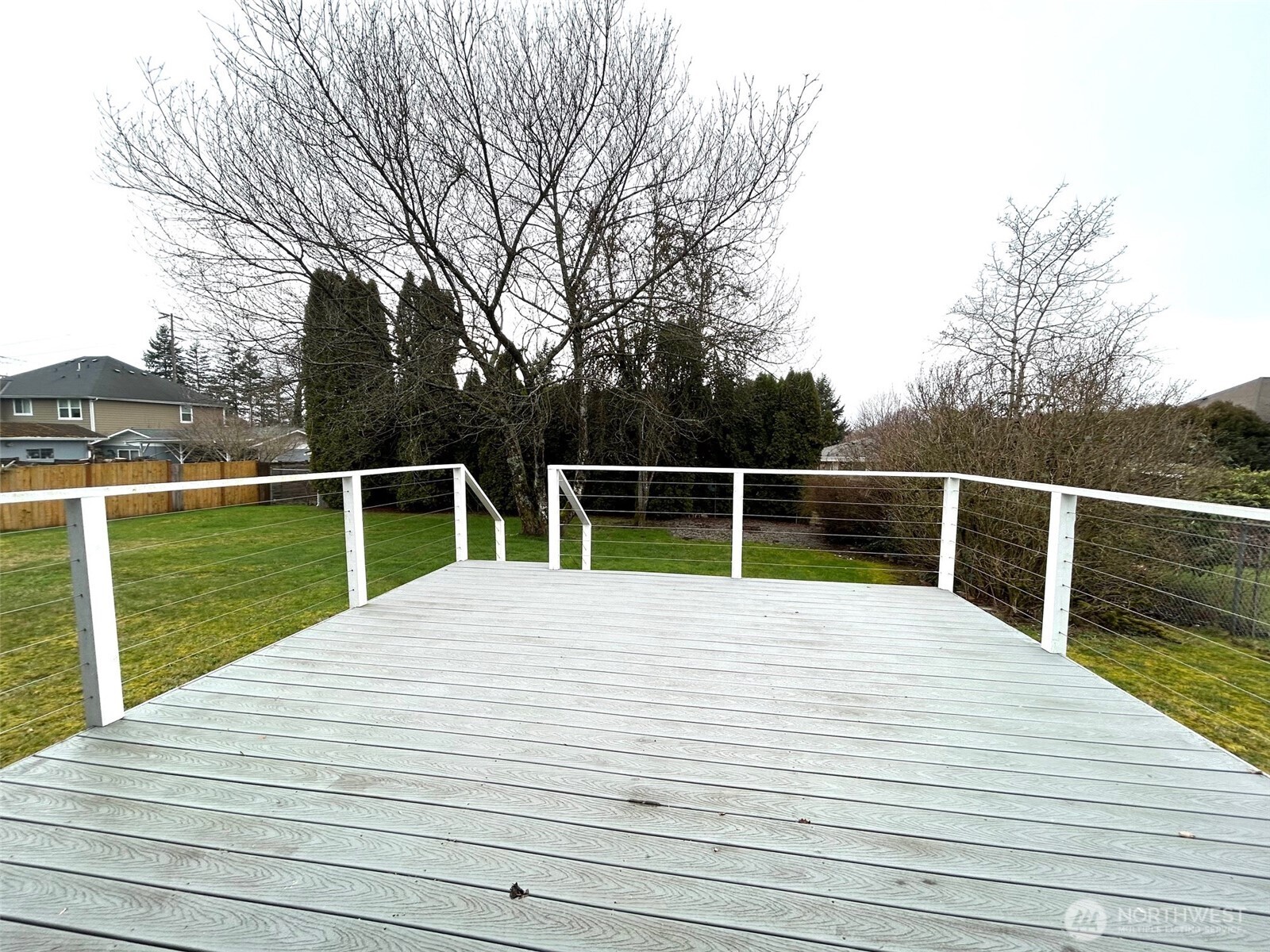 12643 156th Avenue Southeast Renton, WA 98059 - Photo 18 of 19 a view of a wooden deck with a yard