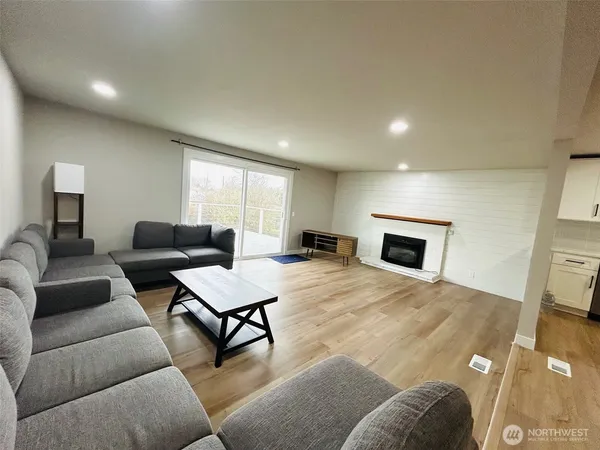 a living room with furniture and a couch