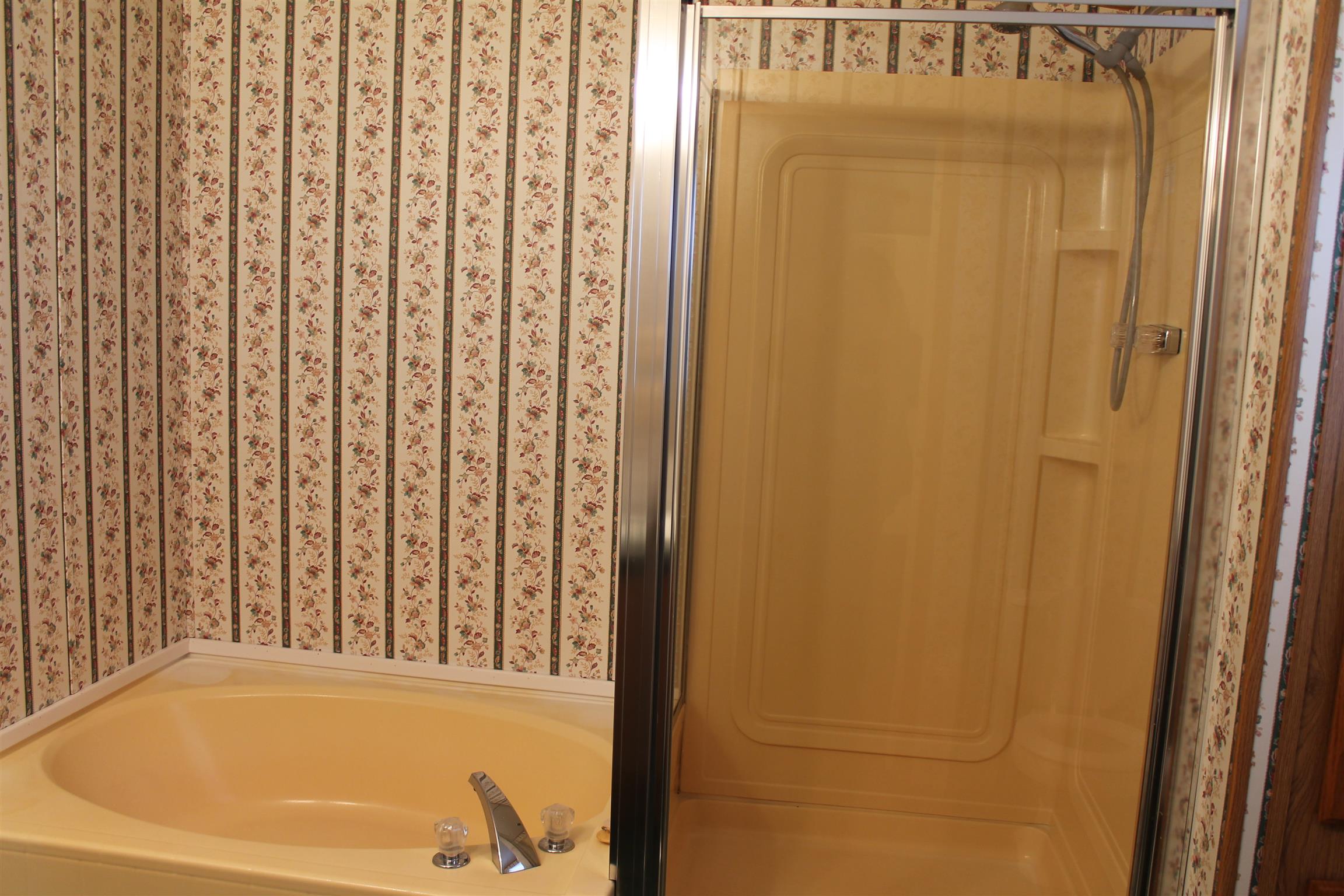 1925 Humphreys Co Line Road Dickson, TN 37055 - Photo 19 of 23 a bathroom with a bathtub