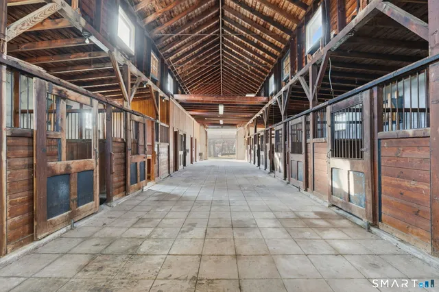 a view of porch with wooden floor