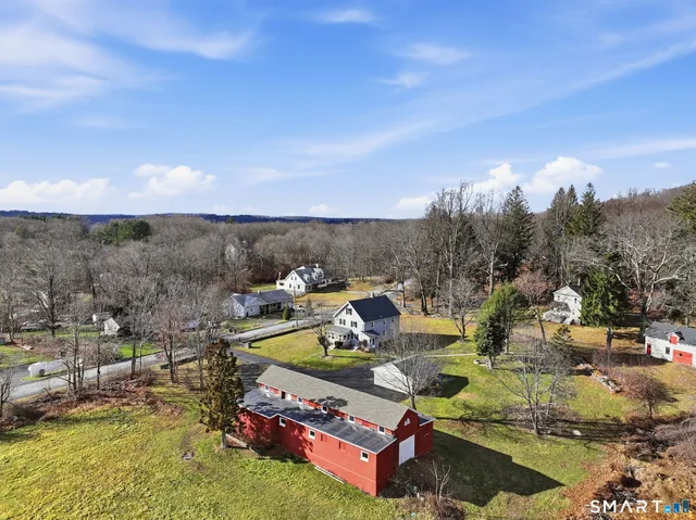 a view of a lake with couches and city view