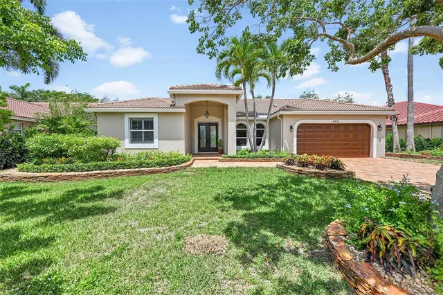 $900,000 | 4910 Northwest 104th Avenue, Coral Springs, FL 33076