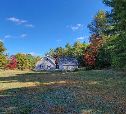 15 Skunk Hill Road Lee, ME 04455 - Photo 7 of 53 West side includes detached garage
