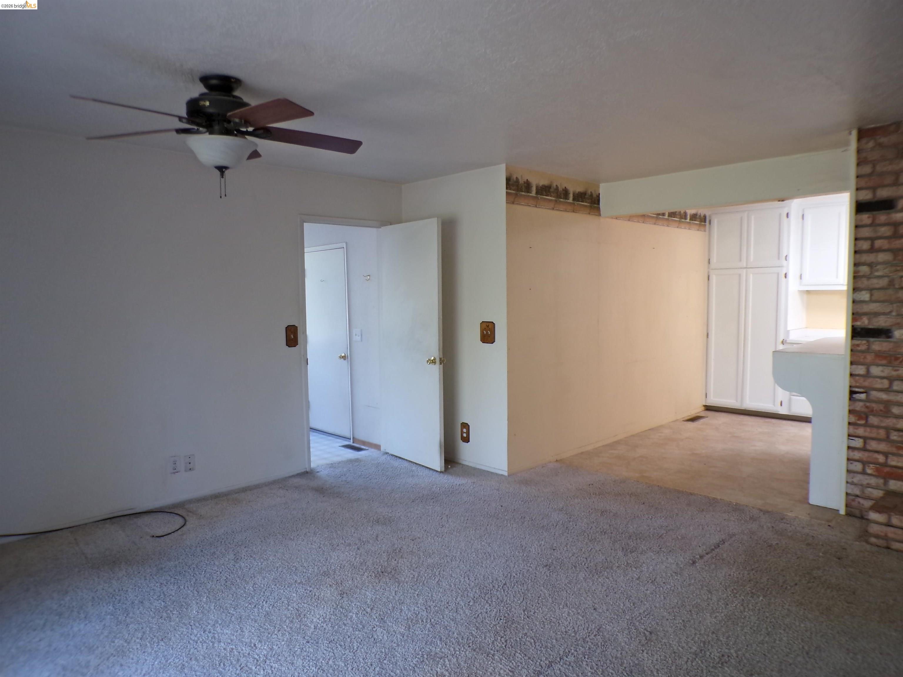 20663 Haiapo Road Mi Wuk Village, CA 95346 - Photo 11 of 24 a view of a room with a empty space and a window