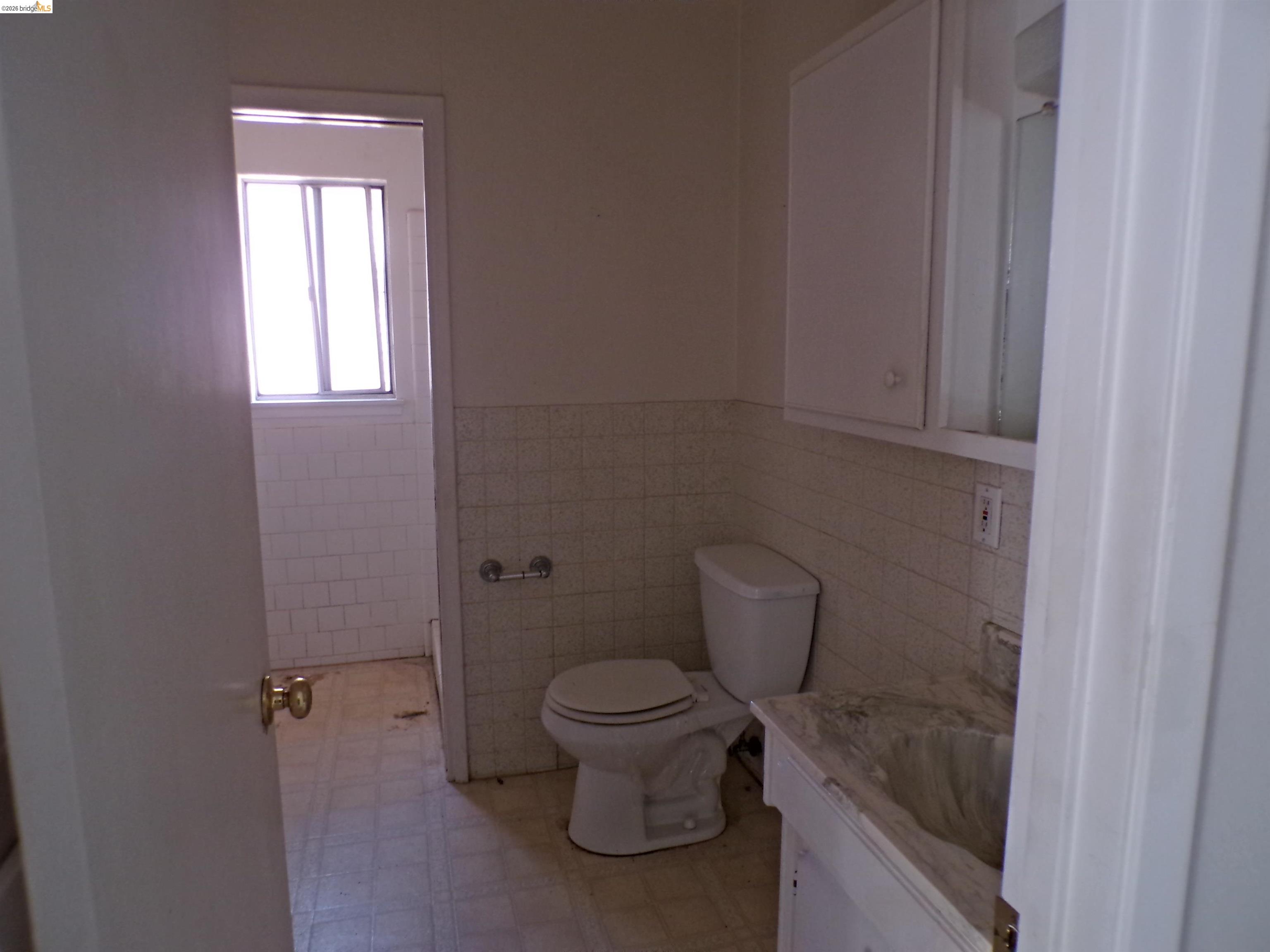 20663 Haiapo Road Mi Wuk Village, CA 95346 - Photo 14 of 24 a bathroom with a toilet and a sink