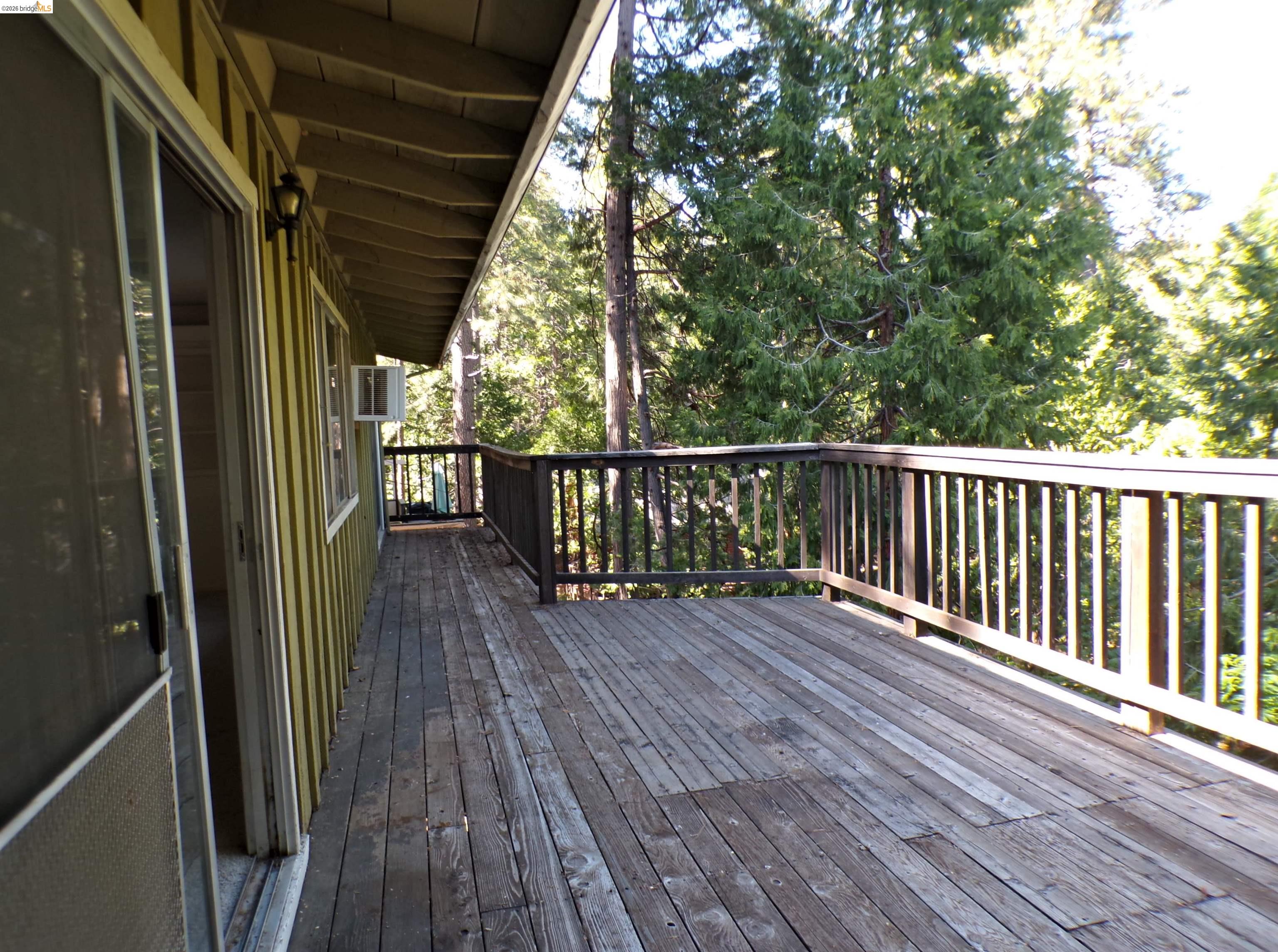 20663 Haiapo Road Mi Wuk Village, CA 95346 - Photo 18 of 24 a view of balcony with wooden floor