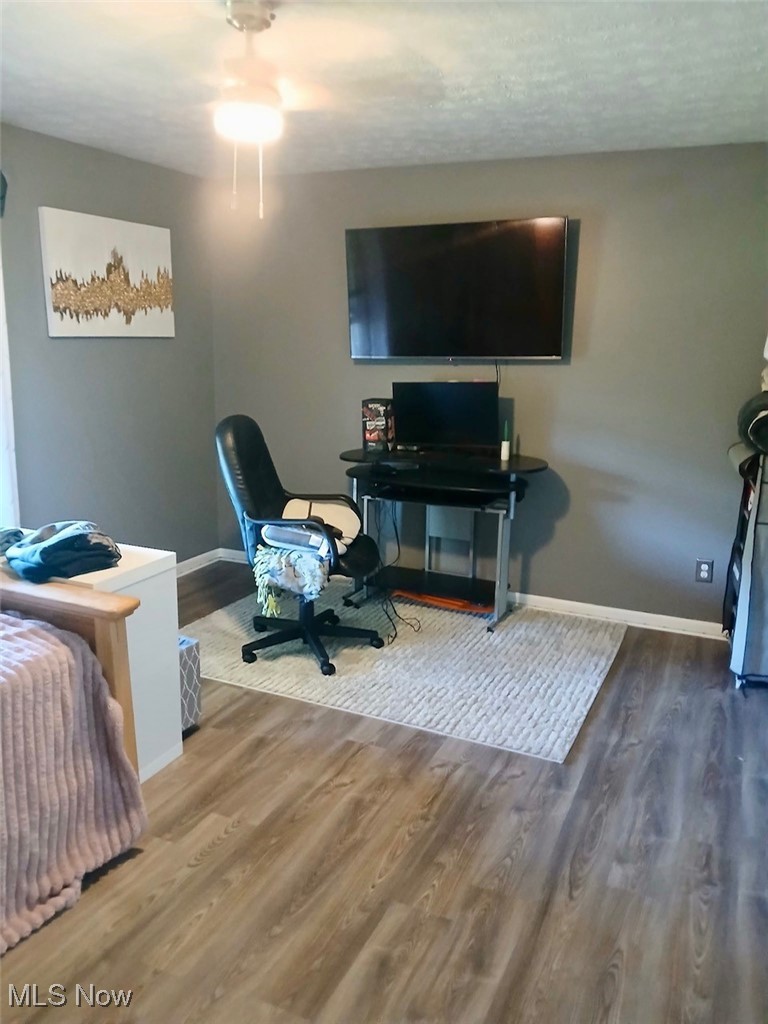 1685 Fattler Ridge Road Philo, OH 43771 - Photo 15 of 24 Home office featuring baseboards and wood finished floors