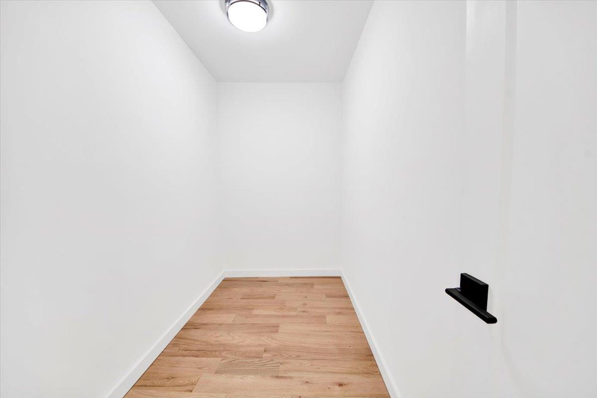 132 Holmes Avenue Hartsdale, NY 10530 - Photo 20 of 34 a view of a room with a wooden floor