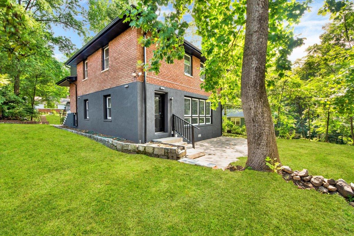 132 Holmes Avenue Hartsdale, NY 10530 - Photo 27 of 34 a view of a house with backyard and garden