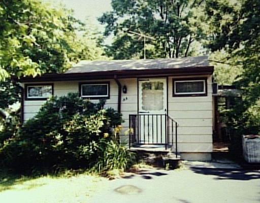 35 Emma Road Stamford, CT 06905 - Photo 1 of 1 a front view of a house with a yard