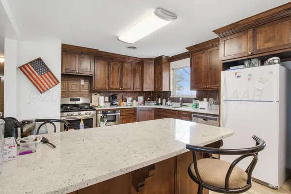 a room with painting and a table