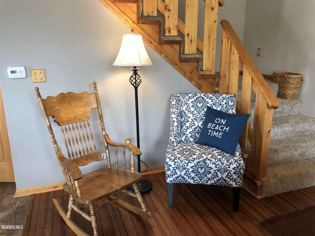 7695 East Winneshiek Road Ridott, IL 61067 - Photo 12 of 15 a view of balcony with furniture