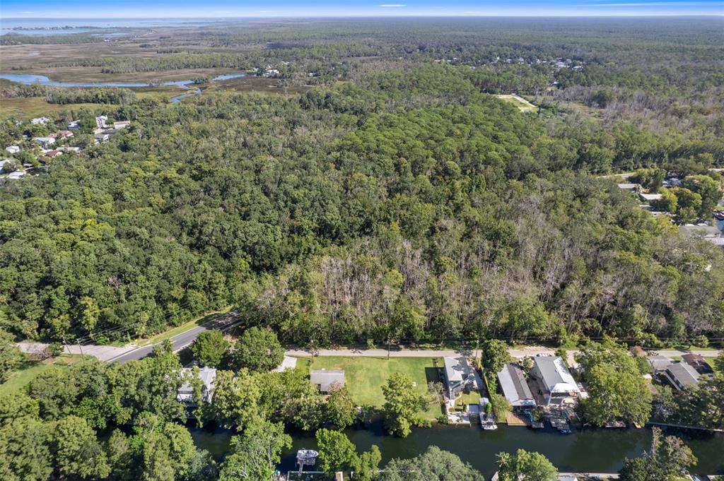 5492 Ramada Street Weeki Wachee, FL 34607 - Photo 12 of 25 an aerial view of a town with couple of houses