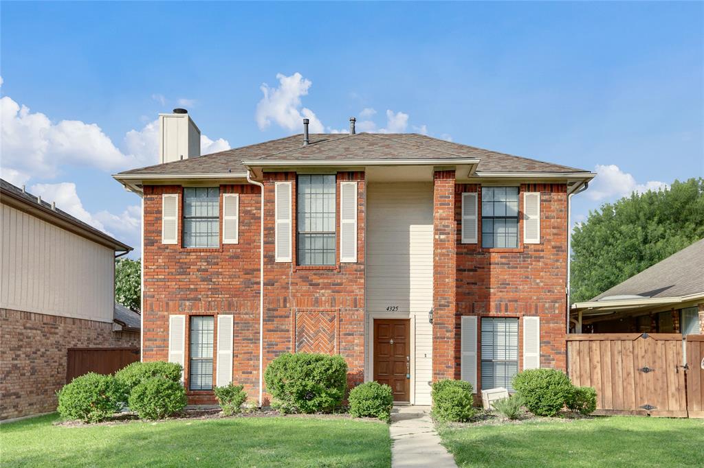 4325 Harvest Hill Road Carrollton, TX 75010 - Photo 1 of 23 View of front of house featuring lovely curb appeal