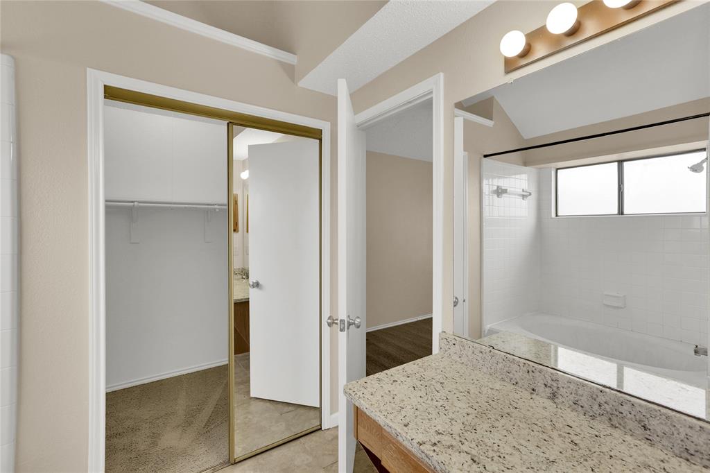 4325 Harvest Hill Road Carrollton, TX 75010 - Photo 22 of 23 Primary bedroom closet view from bathroom