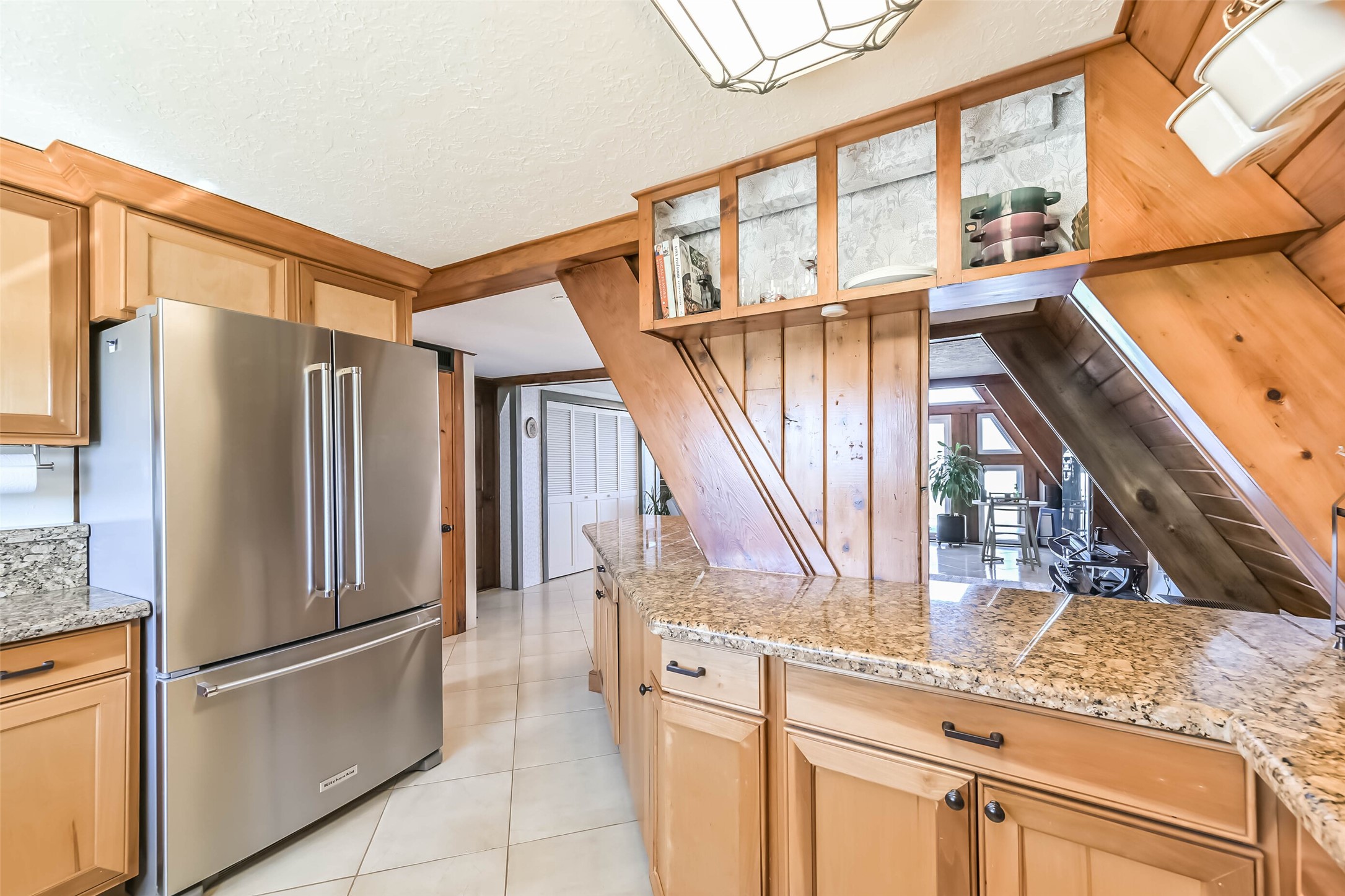 2009 Todville Road Seabrook, TX 77586 - Photo 10 of 46 a kitchen with stainless steel appliances granite countertop a refrigerator and a sink