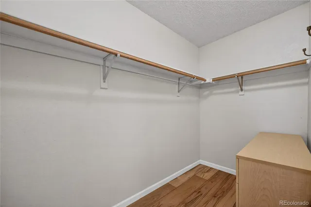 a view of a room with racks on the wall