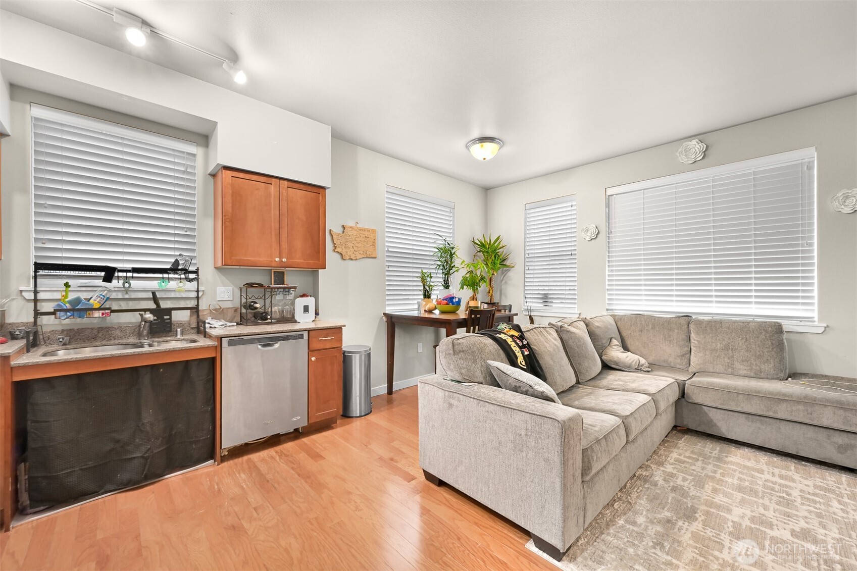 8844 Depot Road, Unit B112 Lynden, WA 98264 - Photo 4 of 27 a living room with kitchen island furniture and a window